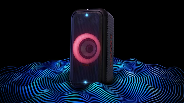 LG XBOOM XL5S is standing on the infinite space. Red woofer lighting and double strobe lightings are on. On top of the speaker a sound eq is displayed. Sound waves are coming out from the bottom of the speaker in order to emphasize its deep bass.